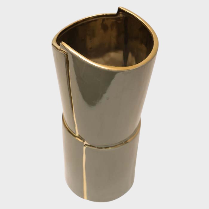 Segmented Ceramic Vase with Metallic Detail: Modern Sculptural Decor
